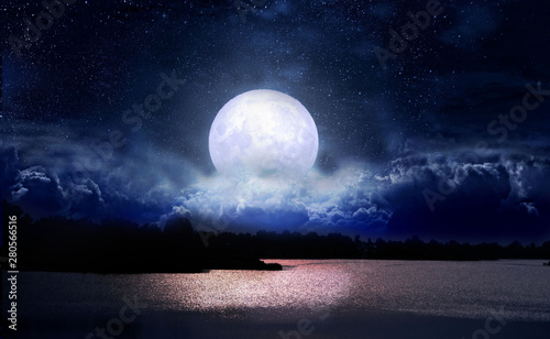 Full moon over the night lake