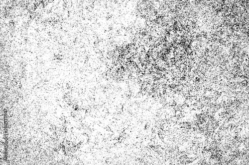 Dirty grunge background. The monochrome texture is old. Vintage worn pattern. The surface is covered with scratches.