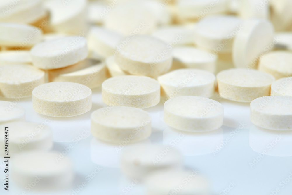 White pills on white background. Close up White pills on white background. Close up