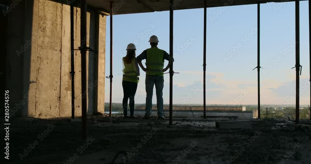Construction Business : teamwork concept : Young engineer standing ...