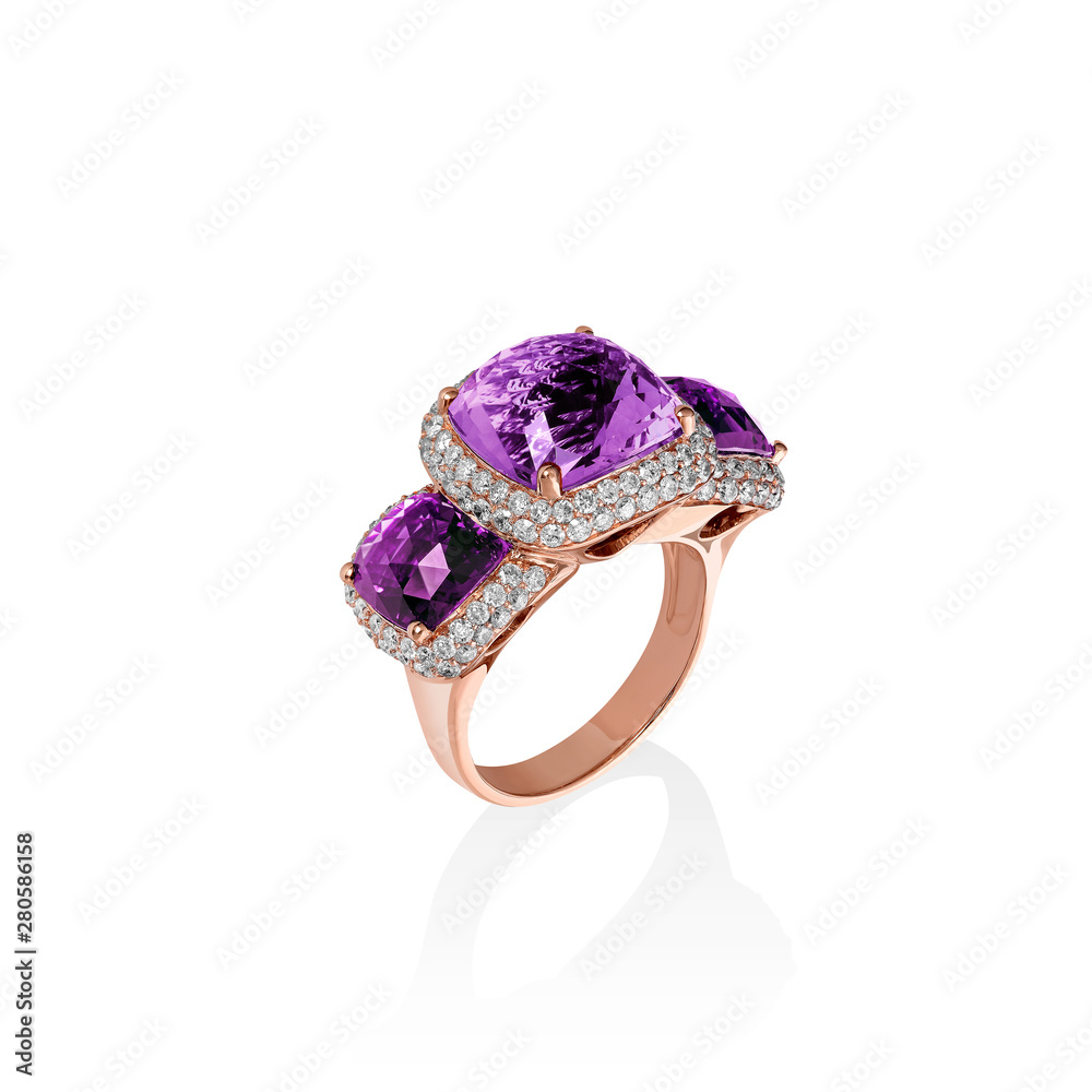 Fototapeta premium Rose gold ring with purple saphires and multiple diamonds, cushion cut gems