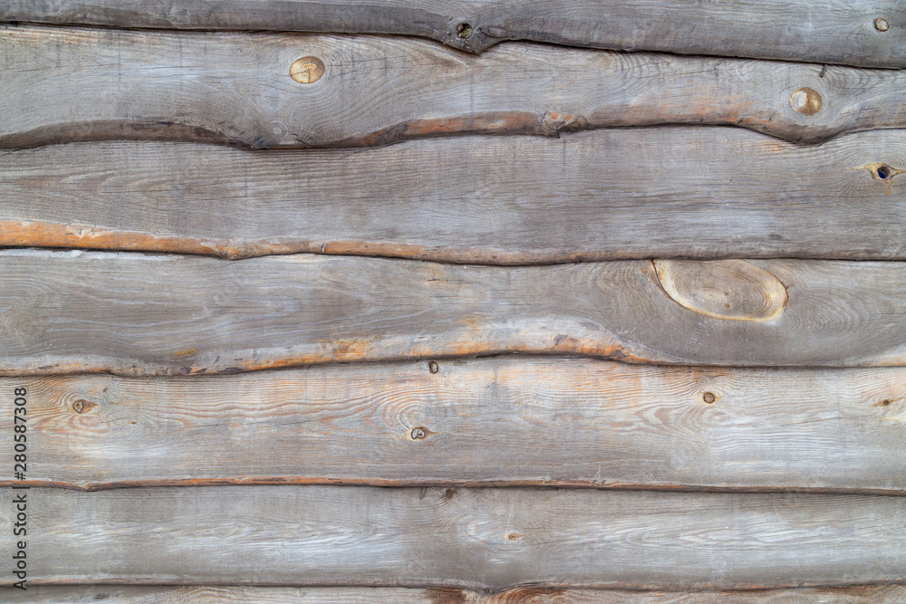 Wooden fence background with old planks of weatherd wood tiled together Wooden fence background with old planks of weatherd wood tiled together