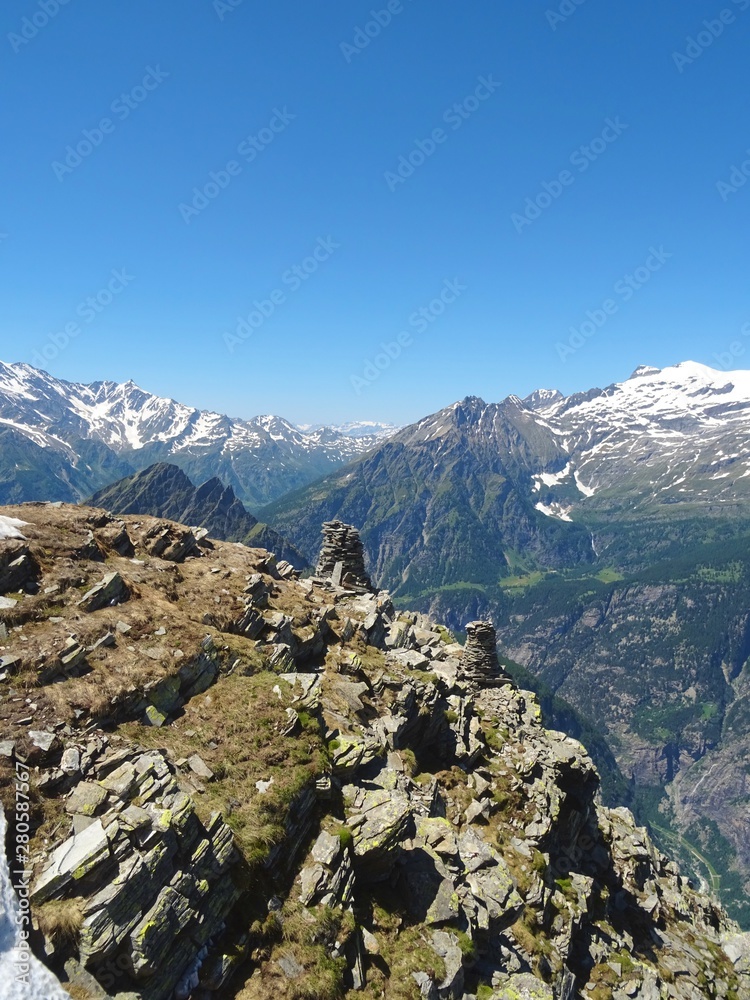 Obraz premium The Alps during a sunny summer day in Val Bognanco, near the town of Domodossola, Italy - June 2019.