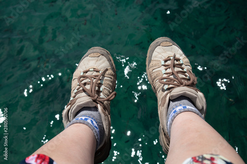 woman feet over clear water