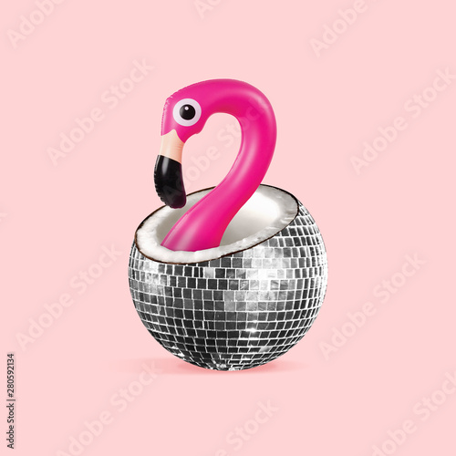 Summer vibes. Coconut as a discoball with rubber flamingo inside it on coral background. Negative space to insert your text. Modern design. Contemporary art. Creative conceptual and colorful collage.