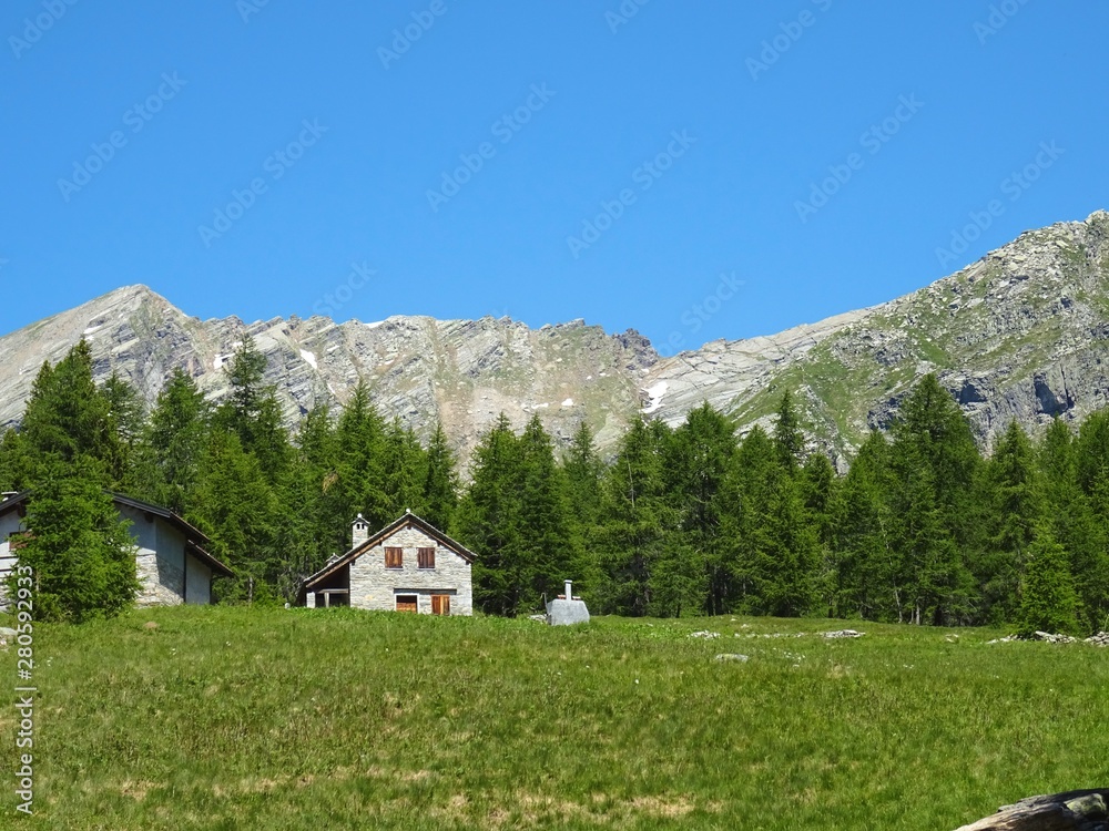 The Alps during a sunny summer day in Val Bognanco, near the town of Domodossola, Italy - June 2019.