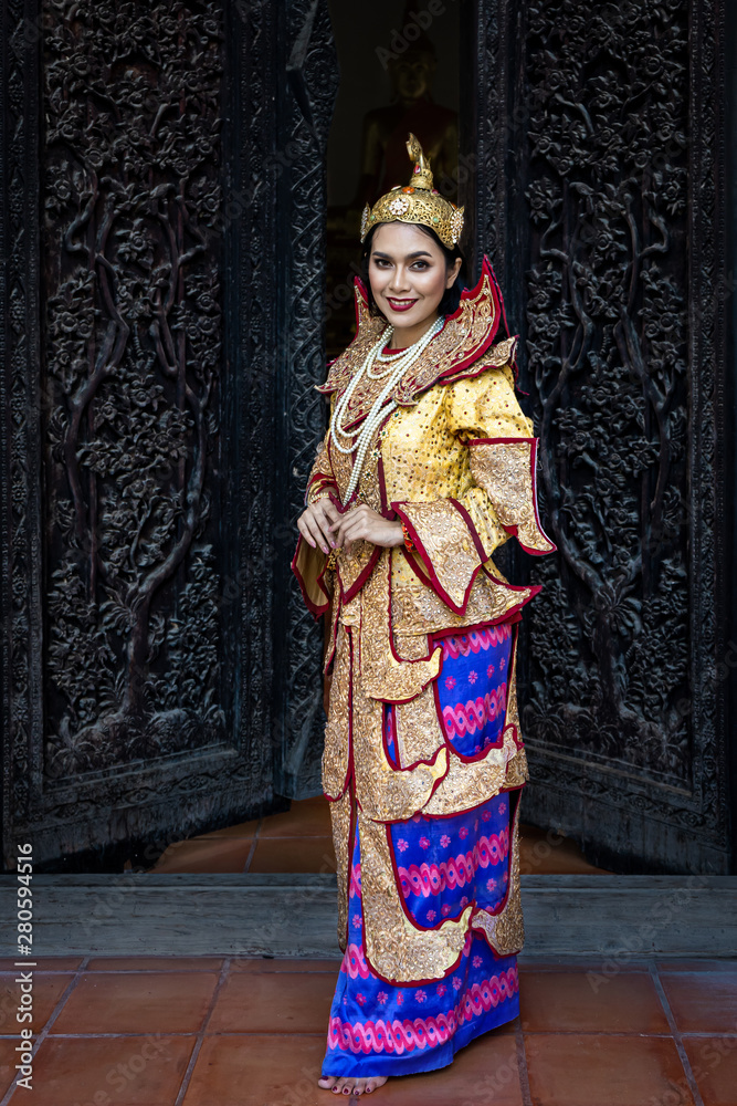 Burmese beautiful woman in antique Myanmar or Burma traditional national dress costume clothes