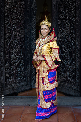 Burmese beautiful woman in antique Myanmar or Burma traditional national dress costume clothes