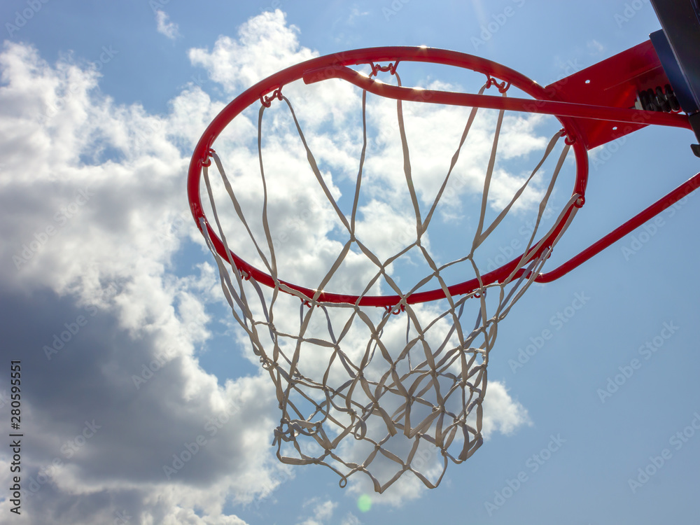 red basketball hoop with white grid
