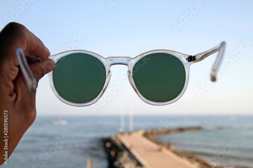 Point of view - looking through a pair of sunglasses photo