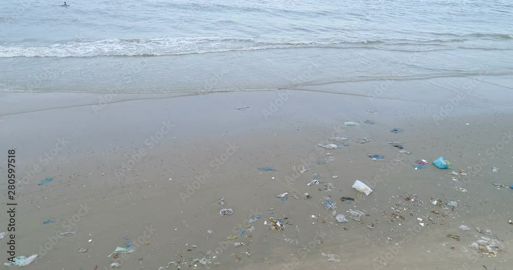Trash, plastic, garbage, bottle... environmental pollution on the beach. Royalty high-quality free stock video footage of trash, plastic bottle on the beach. Waste that polluted the ocean environment Trash, plastic, garbage, bottle... environmental pollution on the beach. Royalty high-quality free stock video footage of trash, plastic bottle on the beach. Waste that polluted the ocean environment