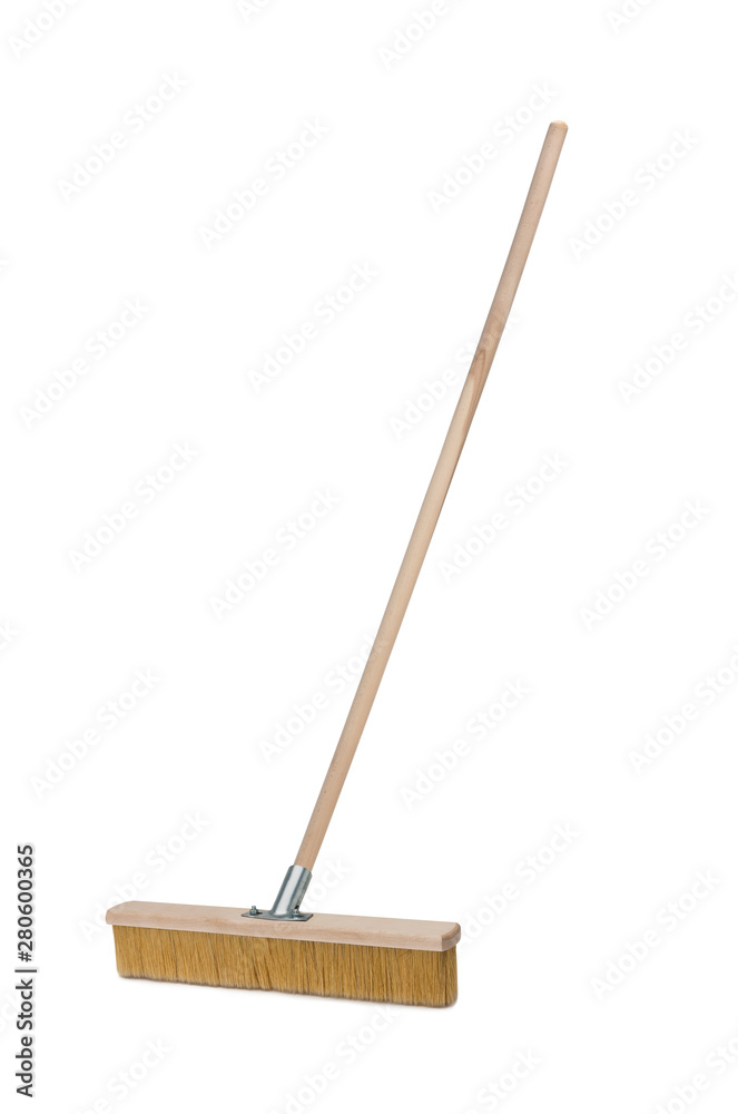 Broom with long wooden handle isolated on white background. Cleaning equipment for housework Broom with long wooden handle isolated on white background. Cleaning equipment for housework