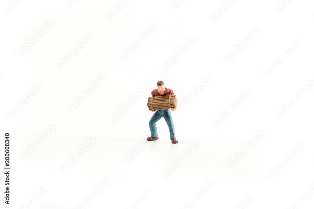 Iconic photo of a Man holding a Box/Chest, Miniature person with white isolated background Iconic photo of a Man holding a Box/Chest, Miniature person with white isolated background
