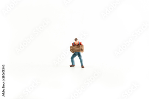 Iconic photo of a Man holding a Box/Chest, Miniature person with white isolated background