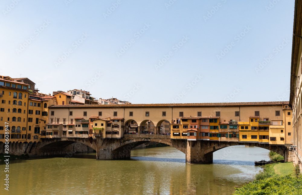 The Ponte Vecchio bridge and the Arno River in Florence, Italy.