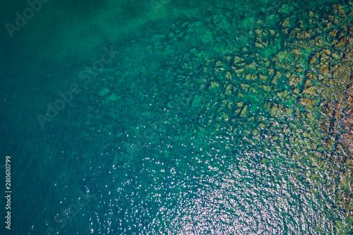 Aerial view of turquoise sea water.