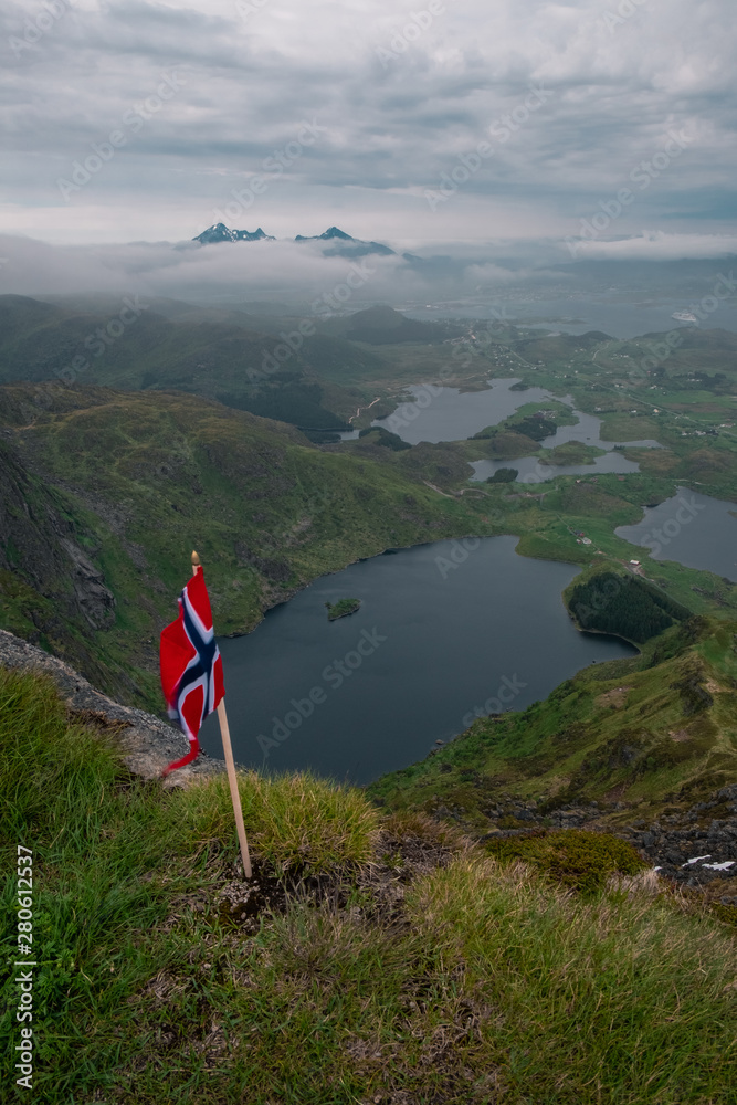 Norwegian flag in the mountains. lake mountains fog. Norwegian flag in the mountains. lake mountains fog.
