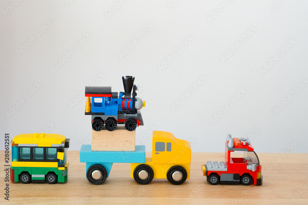 Many of car toy on wood table