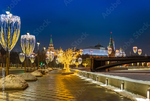 Moscow. Russia. Kremlin. Grand Kremlin palace. Kremlin tower. Embankments Of Moscow. Christmas. New year. Decorated evening city. Winter holidays in Russia.
