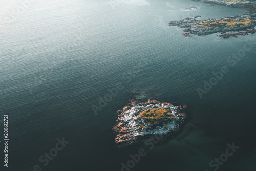 aerial photography of an island at sunset © Jiri