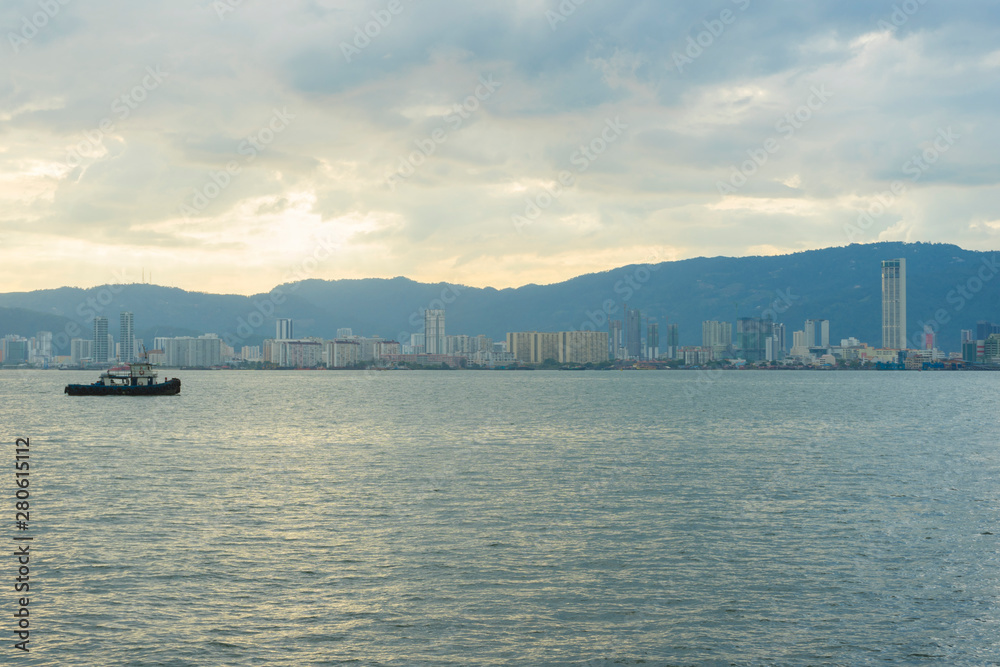 Georgetown cityscape at sunset in Penang, Malaysia.