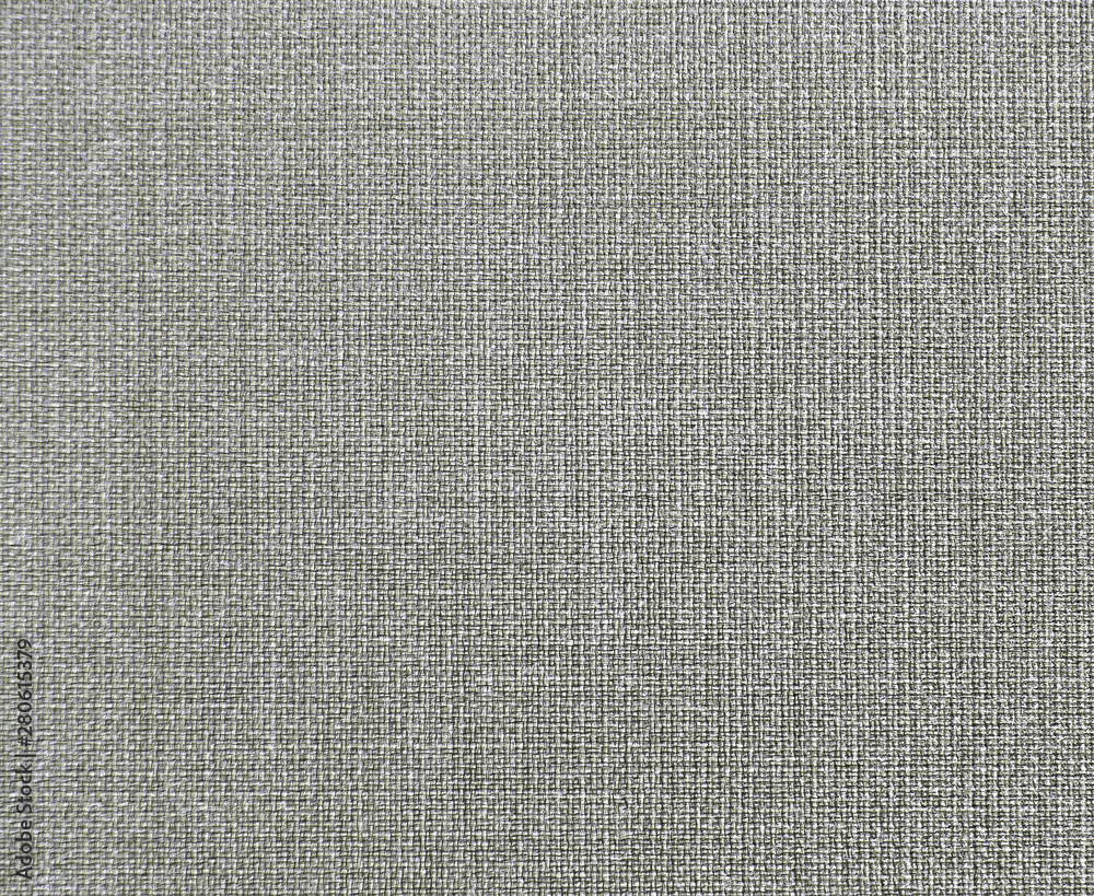 Textured background of gray natural textile Textured background of gray natural textile