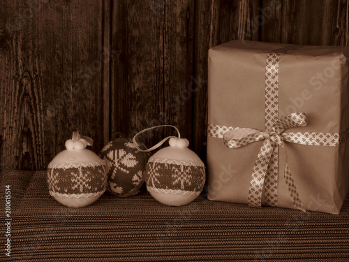 A horizontal photo of christmas decoration with a wooden background.