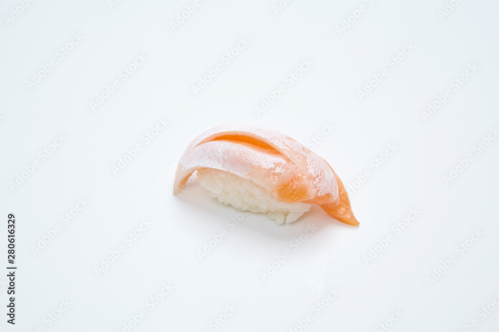 Salmon Sushi on white background in closeup Salmon Sushi on white background in closeup