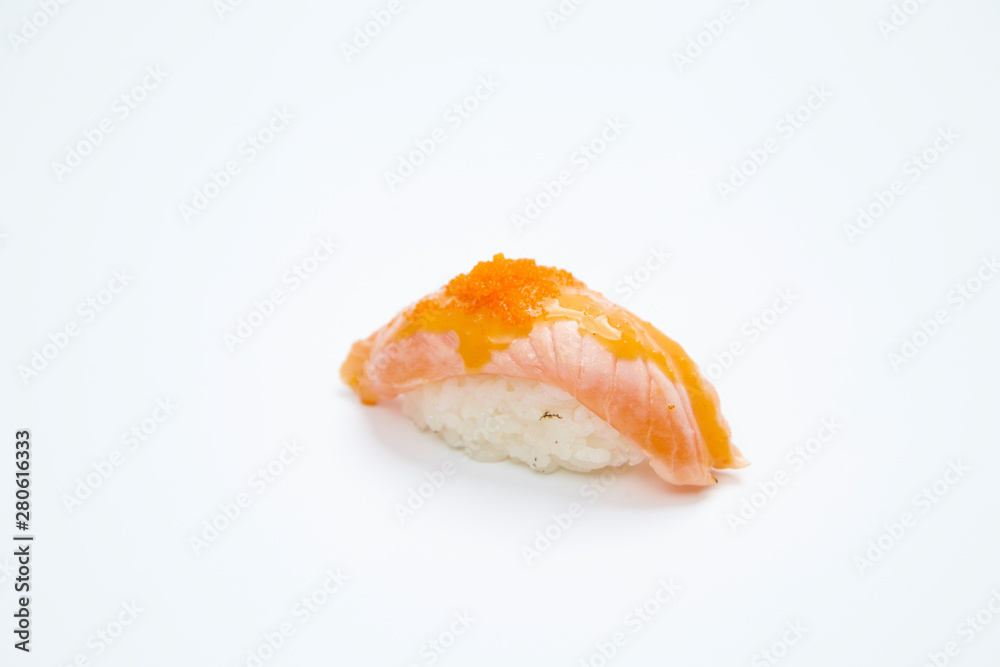 Salmon Sushi on white background in closeup Salmon Sushi on white background in closeup