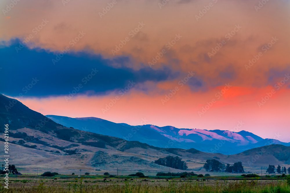 Pastel Sunset over Mountains