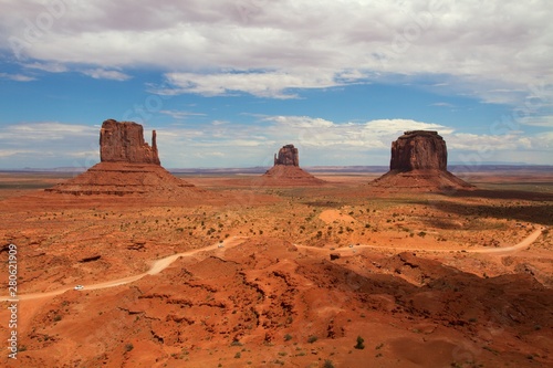 Fototapeta Naklejka Na Ścianę i Meble -  Panoramic view of typical rock formations of Monument Valley,USA valley