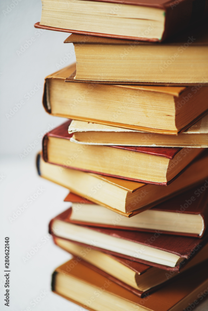 minimalism, old books on the white background minimalism, old books on the white background
