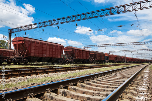 Industrial railway - wagons, rails and infrastructure, electric power supply, Cargo transportation and shipping concept.