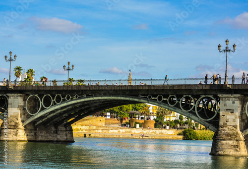 The Triana Bridge of Seville and the Guadalquivir river, Andalusia, Spain. © luisfpizarro