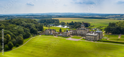 Castle Howard Stately home near York, Aerial banner panorama with gardens photo