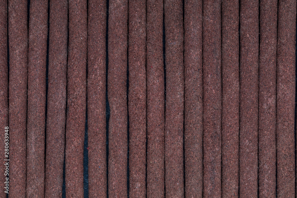 Fototapeta premium Close-up of Tibetan incense sticks (red-sandalwood). Incense texture.
