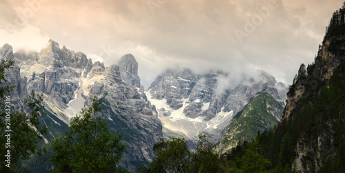 Spectacular view of the Dolomitic massif of Cristallo in the Sexten Dolomites near Cortina d'Ampezzo (Belluno) as seen from Valle di Landro. Veneto, Italy. photo