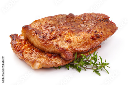 Baked juicy pork steak, isolated on white background