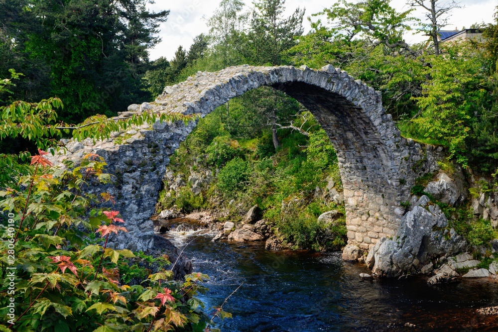 Old Packhorse bridge in Carrbridge, Scotland, built in 1717. It is the oldest stone bridge In Scottish Highlands. Old Packhorse bridge in Carrbridge, Scotland, built in 1717. It is the oldest stone bridge In Scottish Highlands.