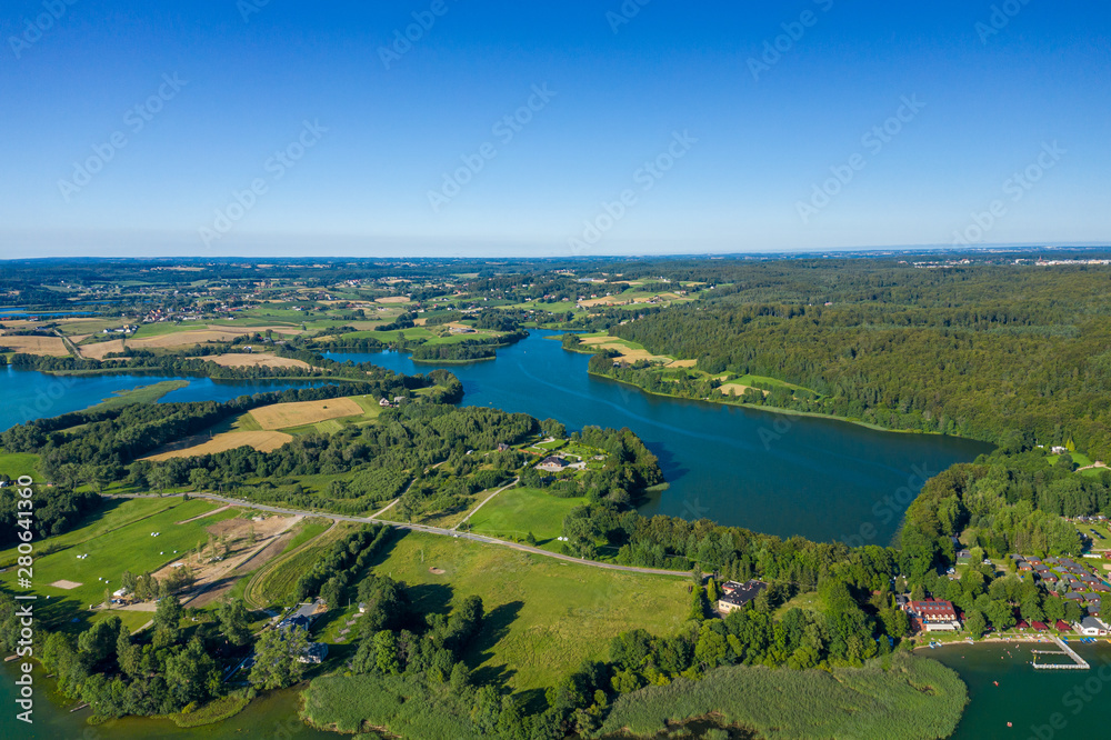 Aerial view of Kashubian Landscape Park. Kaszuby. Poland. Photo made by drone from above. Bird eye view.