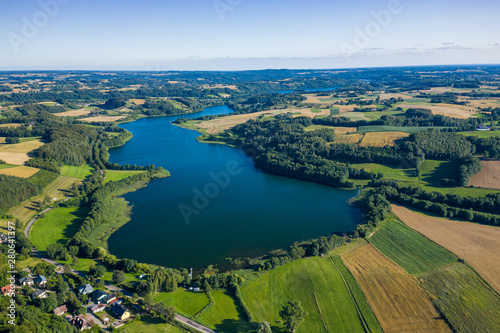 Aerial view of Kashubian Landscape Park. Kaszuby. Poland. Photo made by drone from above. Bird eye view.