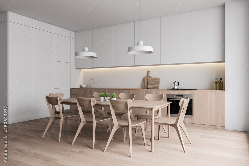 White kitchen corner with wooden table White kitchen corner with wooden table