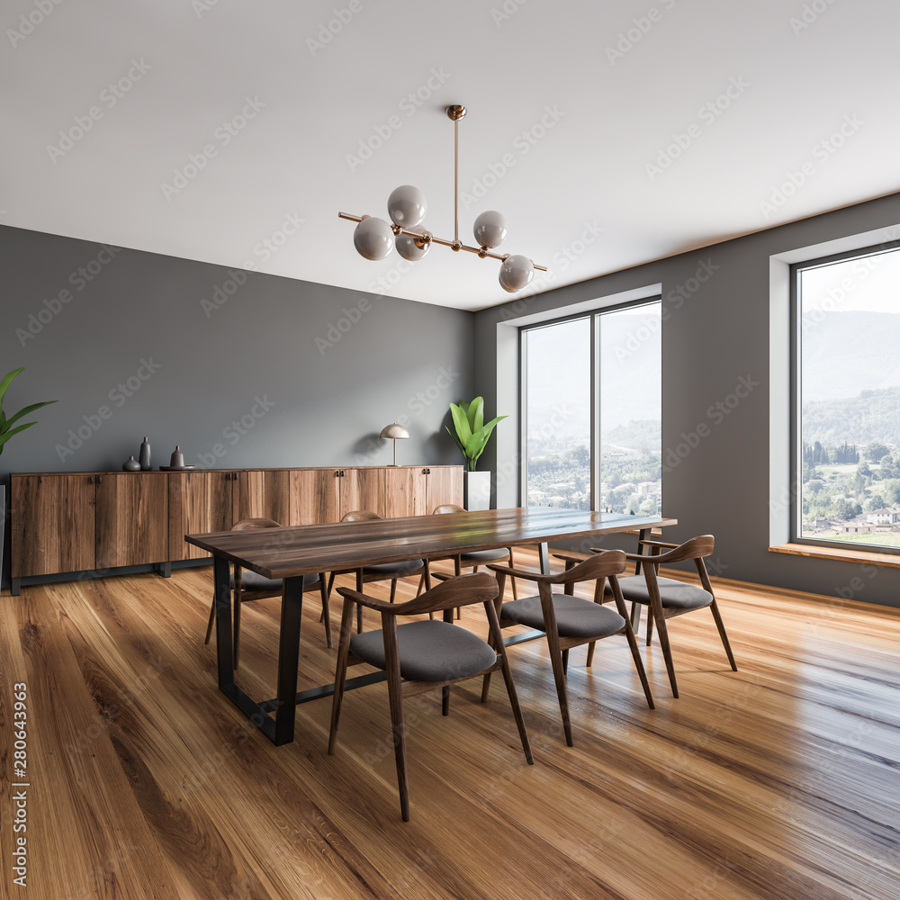 Gray dining room corner with wooden floor