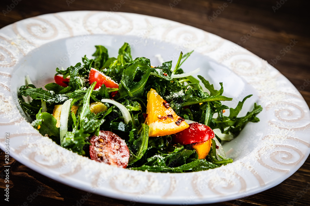 Greek salad on wooden background Greek salad on wooden background