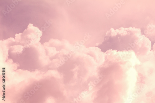 Fototapeta Naklejka Na Ścianę i Meble -  Large light pink fluffy clouds as an abstraction background, copy space