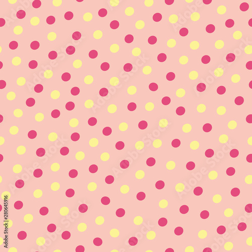 Hand drawn pastel yellow and dark polka dots in irregular all over print. Seamless vector pattern on warm pink background. Great for wellness, cosmetic, party products, fabric, stationery, giftwrap