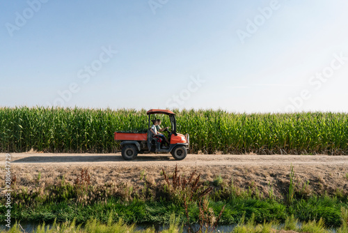 Driving to field of sweet corn
