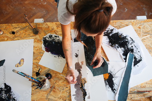 Young woman painting. photo