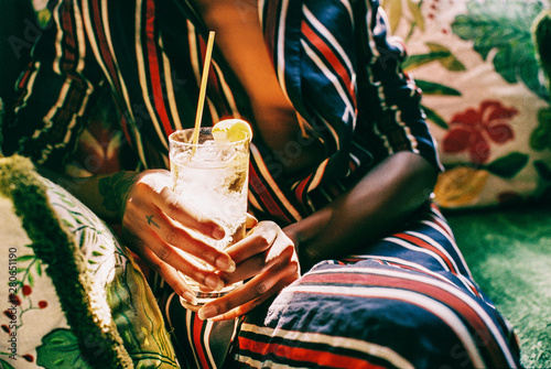 Closeup of Sexy Stylish Young African American Woman Holding Cocktail