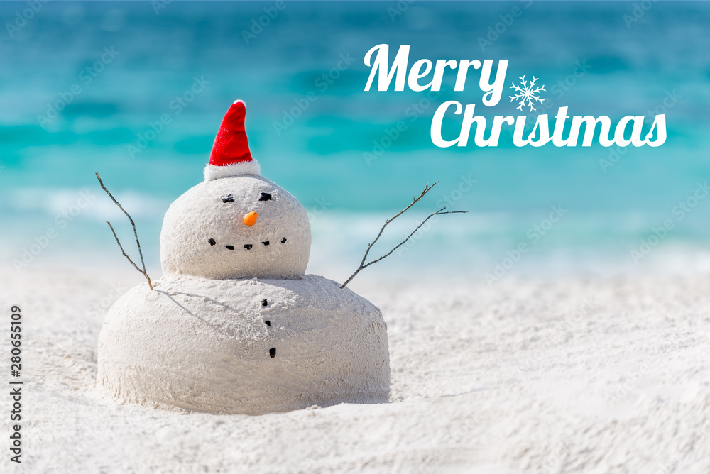 Merry Christmas wishes from a beautiful white sand beach from